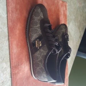 COACH New York  Tennis wear in brown.